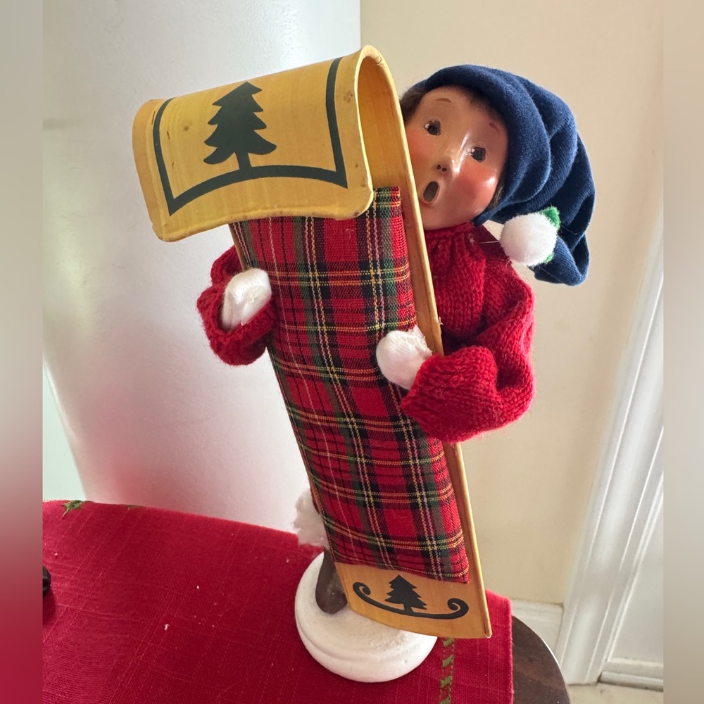Byer’s choice caroler Festive Plaid Christmas Figurine with Sled